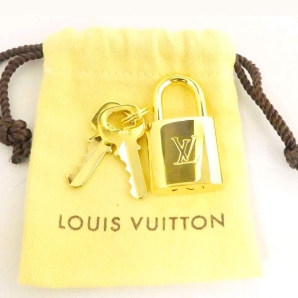 Louis Vuitton Handbags - Louis Vuitton solid brass lock and key